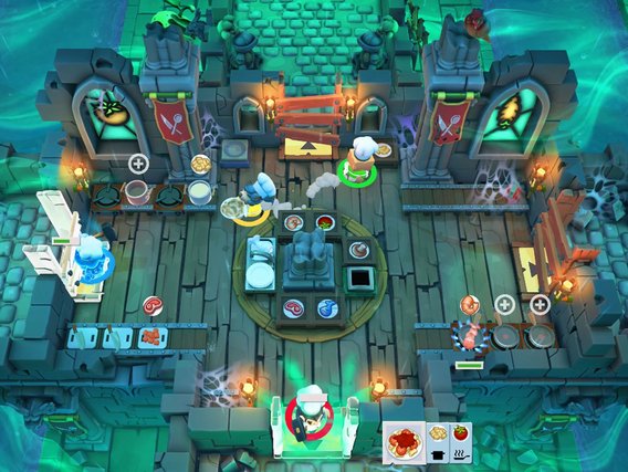 Vogelperspektive einer bunten Koop-Küchenszene mit mehreren Spielercharakteren, die in einer unterirdischen Küche mit grünem Licht verschiedene Kochstationen bedienen.
