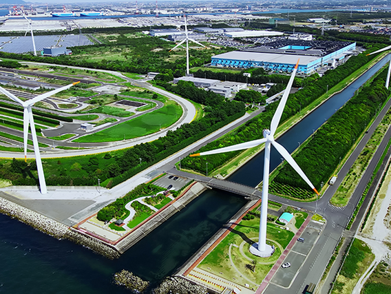 Industrieanlage mit Windkrafträdern - Symbolbild BEHG-Carbon-Leakage-Verordnung