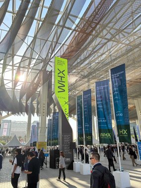 Main entrance to the World Health Expo (WHX) Dubai with large event banners